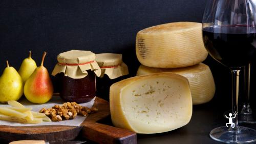 Gourmet platter with a selection of cheeses and preserves for a light lunch in Pompeii, Campania