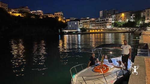 Tasting Cilento products on board a gozzo for a couple's experience in Campania Italy