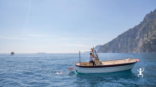 Views of Amalfi, Conca dei Marini, the Fjord of Furore, Praiano, Positano, Maiori, and Minori from a 7-meter boat in Campania