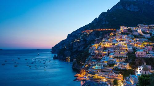 Overview of the culinary delights of the Amalfi Coast, with a sunset view, ideal for bachelor and bachelorette parties