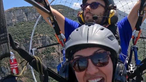 Corporate event in Campania with a team building paragliding experience.