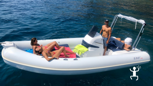 Sun and relaxation on a summer day in a dinghy on the Campania's coast 