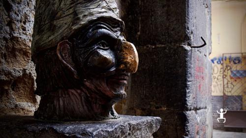 Statue brings luck of pulcinella in the historic center of Naples in Campania