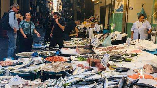 Pignasecca market in Naples with guided tour experience in Campania