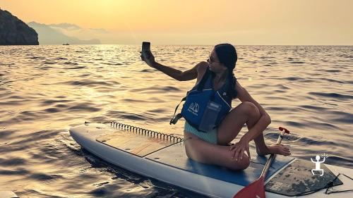 Esperienza per vedere il tramonto a Capri in Sup in estate