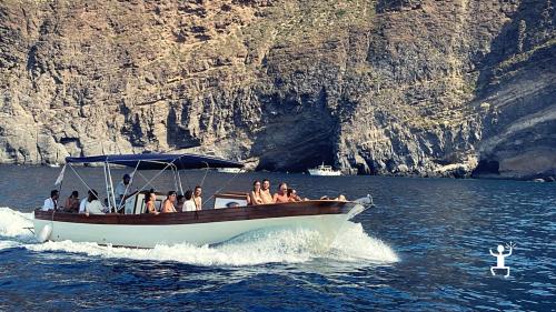 Campania experience in Ischia with entertainment boat ride meal and drinks included for bachelorette and bachelor parties in summer