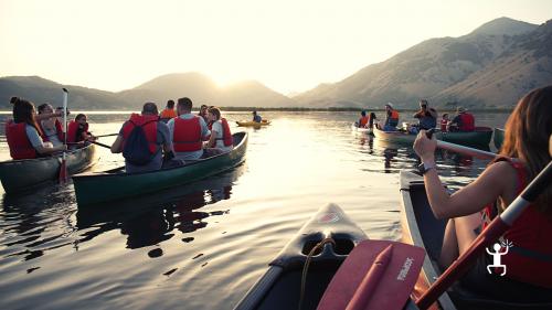 See the sunset while canoeing with friends and family in the Matese Regional Park in Campania