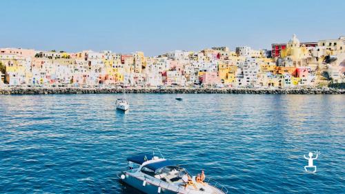 Give the gift of a boat experience to visit the beauty of the island of Procida in Campania, Italy