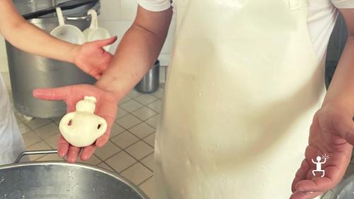 Artisanal product made from mozzarella cheese during a group food and wine experience in Campania, Vico Equense, Italy