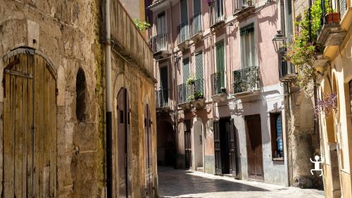 Guided rental bike tour and walk through the medieval village of Sant'Agata de Goti in Campania